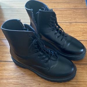 Brand New Black Combat lace up and zip. Size 9.